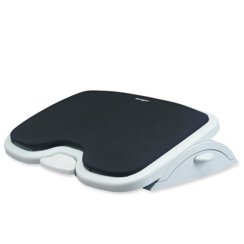 The SoleMate Comfort and Memory Foam Footrest, a black footrest with a memory foam insert and adjustable angle, designed to improve posture and reduce foot fatigue during long periods of sitting at a desk or table.